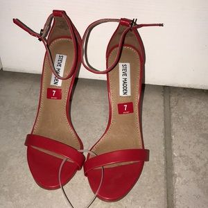 Never worn Steve Madden red heels